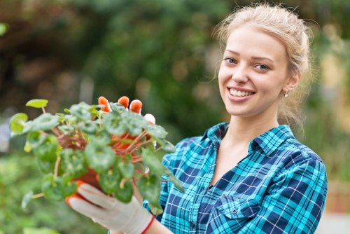Gardener with tools in a residential garden